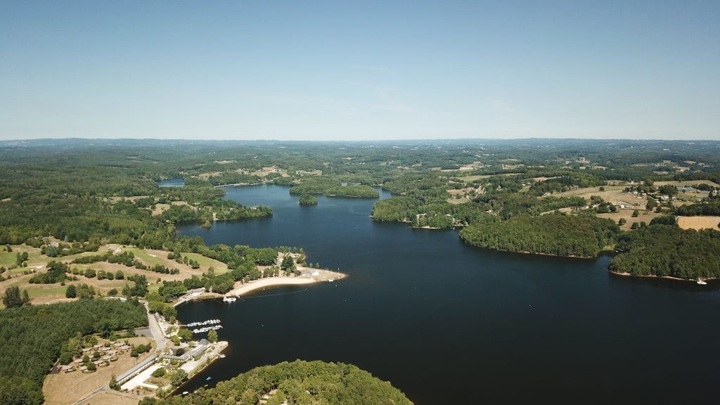 Aerial shot of Lac de Barrage de la Triouzoune,  Retenue de Neuvic d'Ussel, France